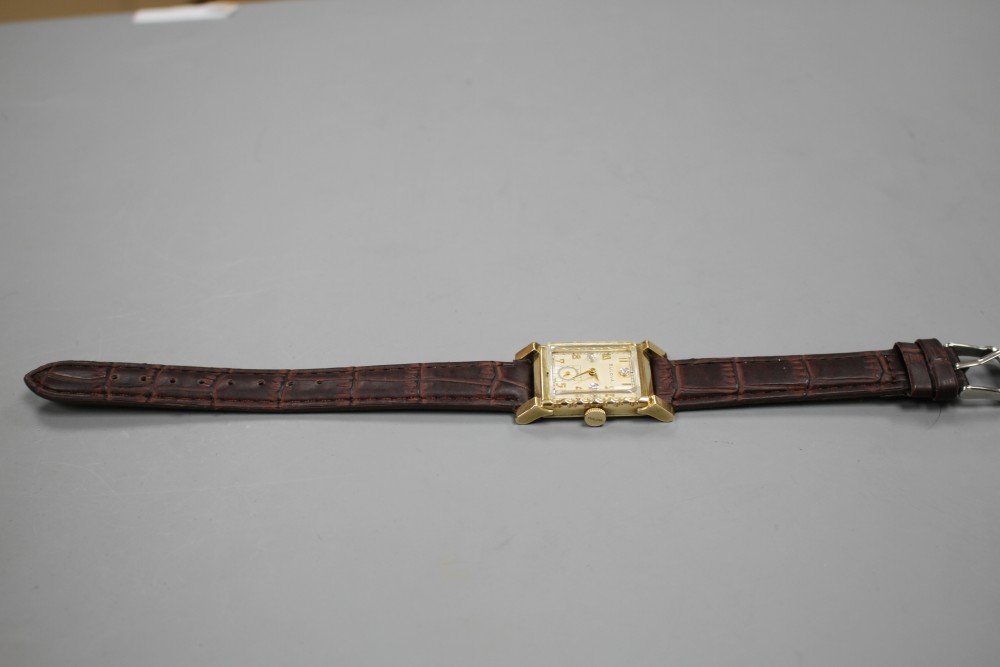 A gentlemans 1940s Art Deco 10k gold filled Bulova rectangular manual wind wrist watch,